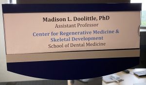 Office sign indicating an assistant professor at UConn